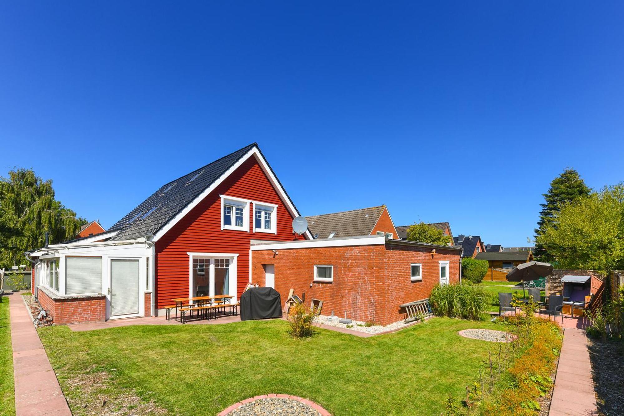 Ferienwohnungen Haus Gezeiten Neuharlingersiel Buitenkant foto